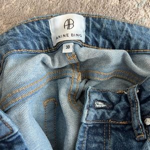 Anine Bing Jeans a full-length.with side slits along both leg openings